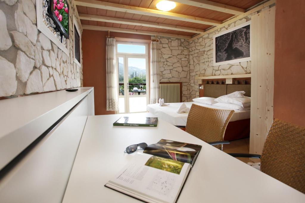 Albergo Garni Orchidea Riva del Garda Rom bilde